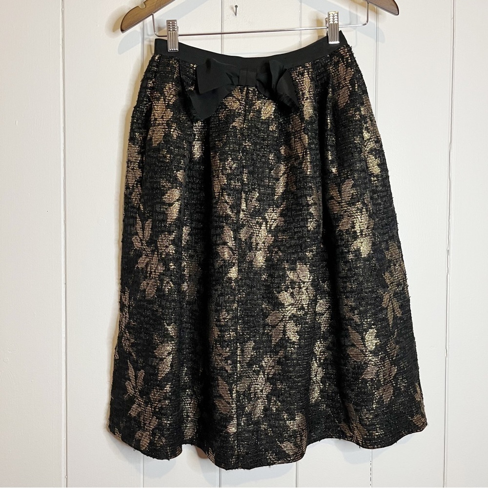 Sportcraft Inc. Black and Gold Skirt.